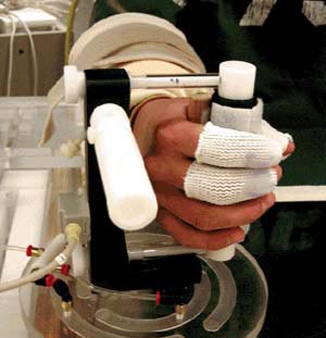 Hand in manipulandum with electromagnetic sensor