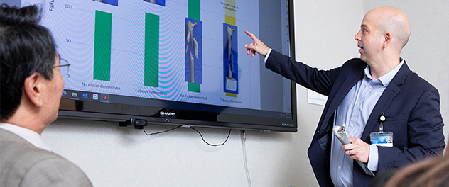 An engineer reviews data, consults with stakeholders and provides his expert opinion.