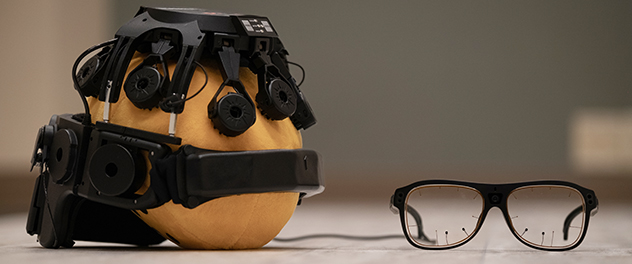 Mobile electroencephalography (EEG) headset and eye-tracking glasses are shown.