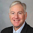 Head and shoulders photograph of John R. Henley, Ph.D.