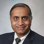 Head and shoulders photograph of Tushar C. Patel, M.B., Ch.B.