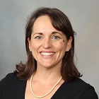 Head and shoulders portrait of Susanne G. Warner, M.D.